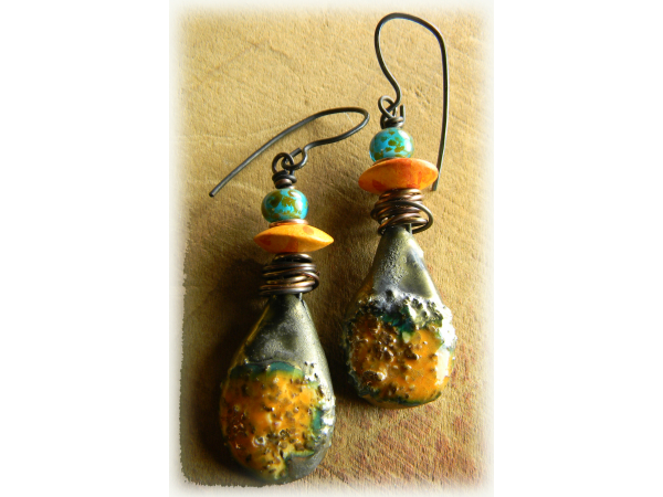 Colorful mix of yellow, orange and turquoise in a rustic copper earring design.