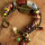 A mix of old and new African beads in a design from Gloria Ewing.