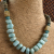 Lovely pale blue green ammonite necklace from Gloria Ewing.