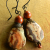 Wire Wrapped Birds Eye Ryolite Earrings Teardrops of rhyolite and red jasper from Gloria Ewing.