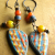 Artisan ceramic and ethnic beaded earrings by Gloria Ewing.