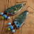 Copper enamel with Czech glass earrings from Gloria Ewing.