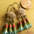 Lovely aqua glass chandelier earrings by Gloria Ewing.