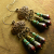 Elegant Chandelier Earrings in Bronze Beaded chandelier earring design by Gloria Ewing.