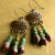 Bohemian Bronze Chandelier Earrings Bronze and red with touches of blue, beaded earrings by Gloria Ewing.