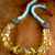 Contrasting citrine and blue amazonite in a necklace by Gloria Ewing.