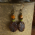 Yellow and autumn red drop earrings from Gloria Ewing.