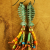 Colorful fringe beaded earrings by Gloria Ewing.