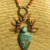 Beaded tribal pendant necklace by Gloria Ewing.