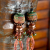Rusty patina charms and crusty lampwork in earrings from Gloria Ewing.