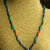 Green turquoise with African trade beads by Gloria Ewing.