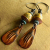 Agate beaded earrings with southwest charms by Gloria Ewing.