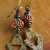 Long dangle earring design with inlaid Tibetan beads from Gloria Ewing.