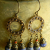 Beaded Blue Lapis Earrings Bronze hoops with lapis lazuli drops by Gloria Ewing.
