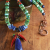Tribal beaded pendant necklace in colorful stones by Gloria Ewing.