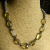 Chunky lemon quartz faceted nuggets in this unusual choker by Gloria Ewing.