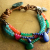 Colorful Gemstone Bracelet by Gloria Ewing Boho southwestern beaded bracelet design with leather.