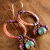 Mykonos ceramic dangles on copper hoops from Gloria Ewing.