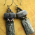 Purple dormutierite earrings by Gloria Ewing.