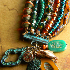 Ten strand Czech glass beaded bracelet by Gloria Ewing.