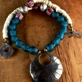 Handmade bronze pendant with African beads from Gloria Ewing.