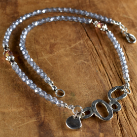 Great with jeans or dress up, beaded design by Gloria Ewing.