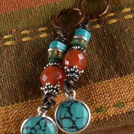 Colorful tribal mix of beads with turquoise by Gloria Ewing.