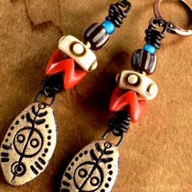 Artisan ceramic, African glass and bone earrings by Gloria Ewing.