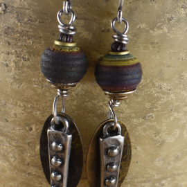 Layered dangle earring with artisan glass and mixed metals.