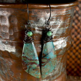 Chrysocolla wing shaped matched stone earrings by Gloria Ewing.