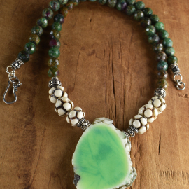 African ruby with green chrysoprase by Gloria Ewing.