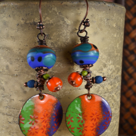 Artisan lamp work glass with copper enamel, design by Gloria Ewing.