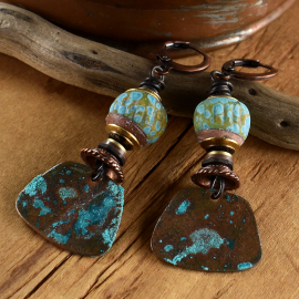 Crusty patina and artisan lampwork glass design.
