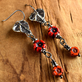 Pewter and red flower dangle earrings from Gloria Ewing.