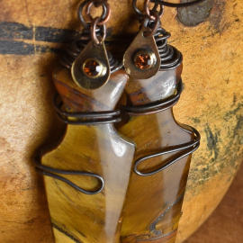 Tribal wire wrapped tiger eye design by Gloria Ewing.