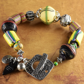 Lovely bright African beads with Sterling silver by Gloria Ewing.
