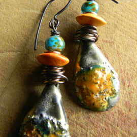 Ceramic and Czech glass earrings with copper wire wrap by Gloria Ewing.